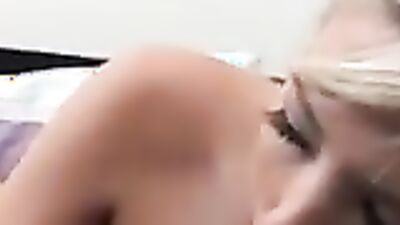 Close-up on a blonde doll while she's giving a hot blowjob