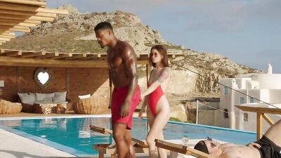 Handsome black man bangs a petite redhead gal by the pool