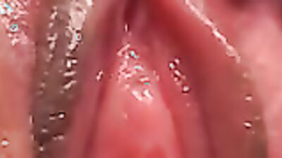 Close up on the Asian girl's very wet snatch during toying