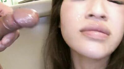 Pretty Japanese girl blows two guys and gets messy facials