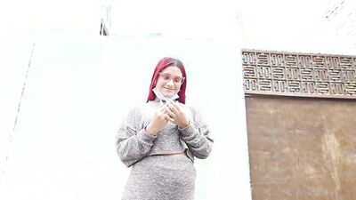 Foxy redhead with sexy glasses strokes a dick and sucks it