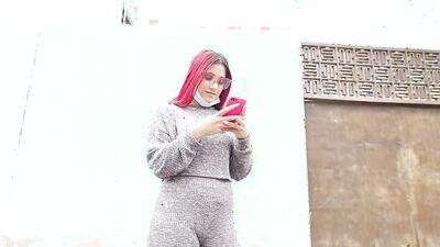 Foxy redhead with sexy glasses strokes a dick and sucks it