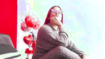 Foxy redhead with sexy glasses strokes a dick and sucks it