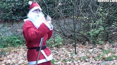 Foxy blonde blows a naughty Santa and rides his cock outdoors