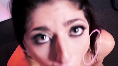 Nikki Knightly flirts with the camera while sucking a hard cock