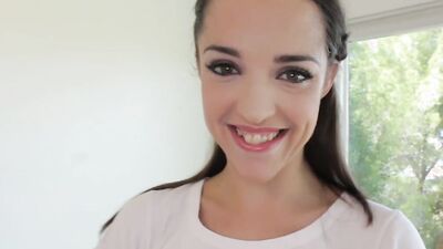 Nikki Next flirts with the camera while sucking a big cock