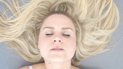 Marvelous blonde Barra Brass is filmed while playing with her pussy