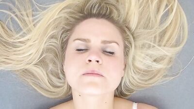 Marvelous blonde Barra Brass is filmed while playing with her pussy