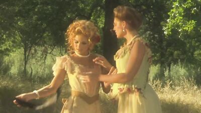 Two classy babes are having lesbian sex in the yard