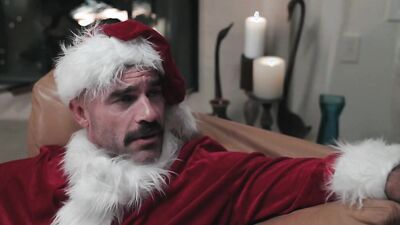 Tattooed babe Crystal Taylor is being shagged by a kinky Santa