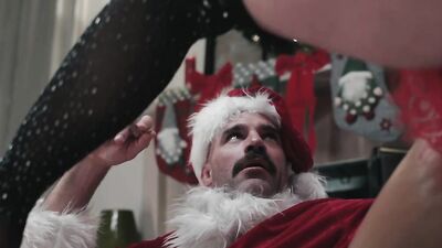 Tattooed babe Crystal Taylor is being shagged by a kinky Santa
