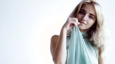 Aria Bella strips naked and plays with her cherry on the floor
