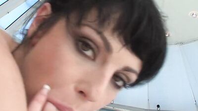 Brunette sucks hard dick and gets fucked in her shaved pussy