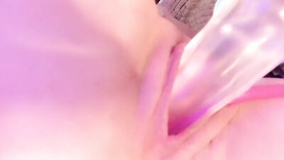 Girl shows her pink pussy from up close while playing with toy