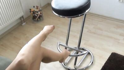 Charming girl cock-teases with long legs and sexy feet