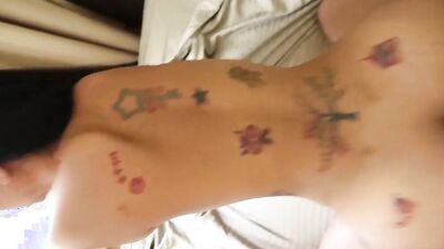Tattooed Asian bitch likes to suck and fuck big dicks