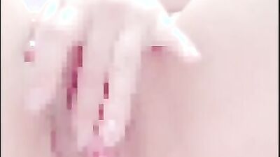 Unknown chick is masturbating her tight pussy in this close up video