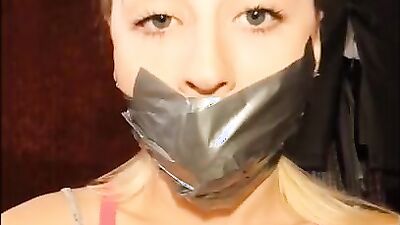 Nasty teen gets her mouth stuffed with panties, ball and duct tape
