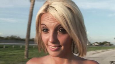 Blonde amateur with fake boobs is showing her intimate parts in public