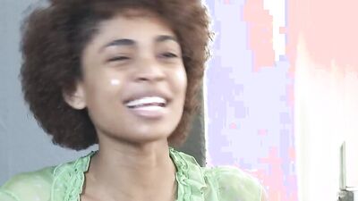 Tight Ebony with curly hair puts a dildo in her cherry