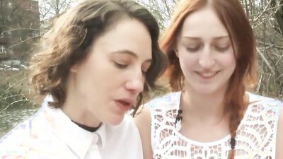 Blonde and redhead lesbian girls are sharing one huge dildo