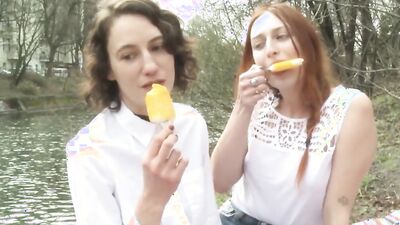 Blonde and redhead lesbian girls are sharing one huge dildo