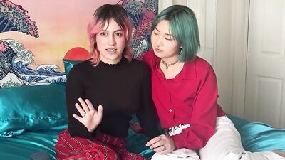 Two kinky lesbian nymphos are shoving a huge dildo in their pussies