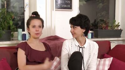 Cute teens are having hot lesbian action on the sofa
