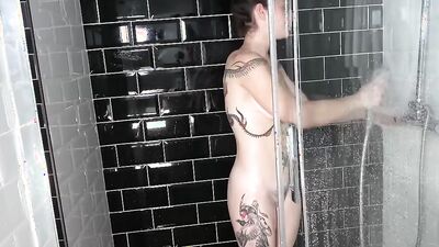 Curly brunette with glasses is preparing her pussy for a good fuck