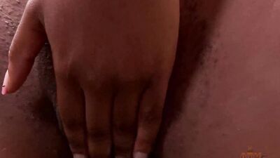 Serenity Evans uses body lotion while caressing her tight clit