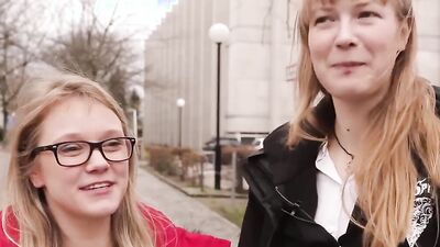 Two nerdy female students are experimenting with their sexual orientation