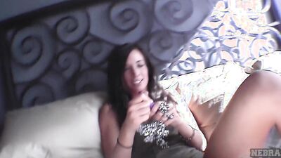Adorable brunette amateur inserts a dildo in her wet cunt