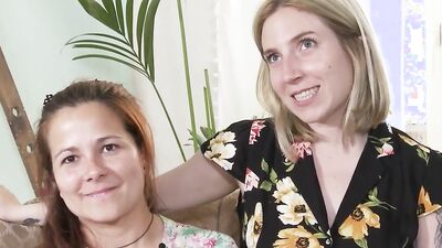 Kinky redhead and juicy blonde are sucking each other's nipples