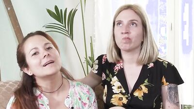 Kinky redhead and juicy blonde are sucking each other's nipples