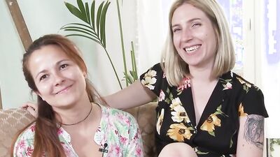 Kinky redhead and juicy blonde are sucking each other's nipples