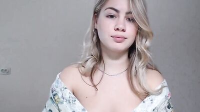 Lovely blonde girl teases with her nice booty on a live webcam show