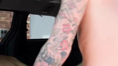Jasmine Jae is riding tattooed bloke's cock out in the open