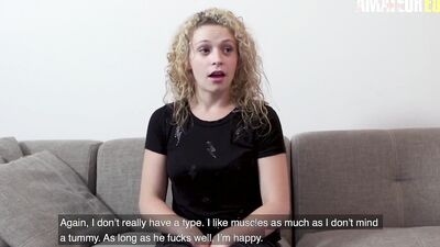 Curly haired babe is getting bonked on the couch by a stranger