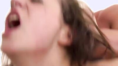 Tattooed German doll is riding dude's hard prick on the couch