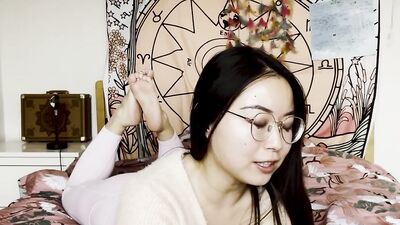 Nerdy Asian doll rubs her twat in front of the camera