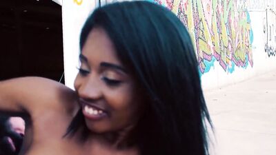 Ebony teen babe is riding stranger's cock out in the open