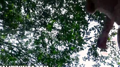 Lovely April Dawn plays with stranger's cock out in the open