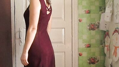 Amateur mature is getting dressed in front of the cam