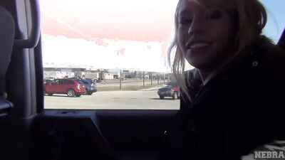 Amateur blonde chick is rubbing her cunt inside the car