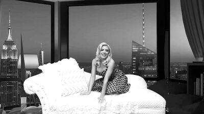 Busty babe is having some fun in this black and white footage