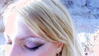 Blonde Love Crystale is riding hard schlong out in the open