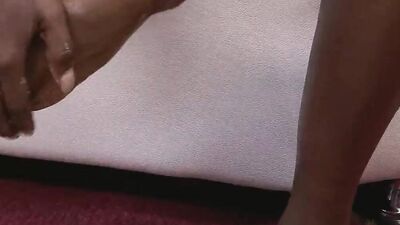 Skinny ebony babe Tiffany Tailor spreads and fingers her pussy while she lotions up