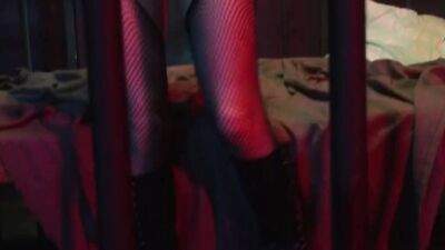 Blonde with big tits wears latex boots while being