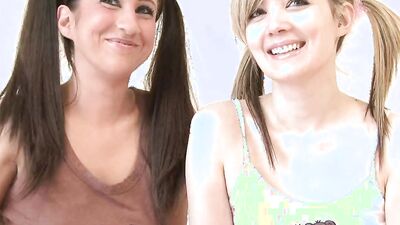 Two gorgeous lovely babes touch each other seductively for your pleasure