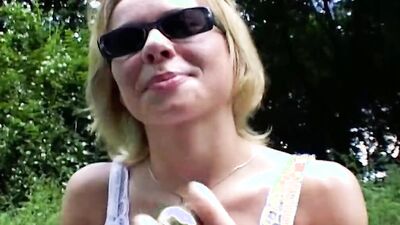 Sweet German teen pleasing her tight pussy in the woods